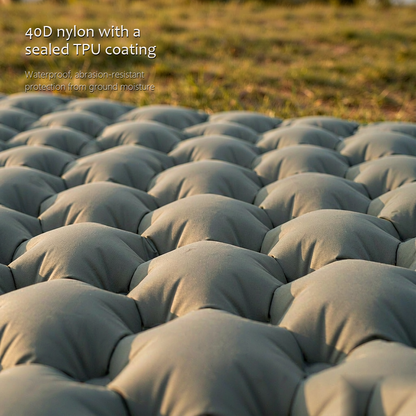 Layered view of the AirRest pad fabric, 40D ripstop nylon with TPU coating, waterproof and durable.