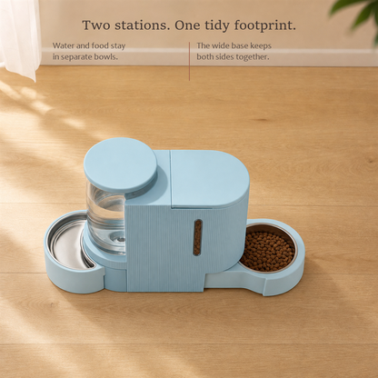 FeedFlow pet feeder and water station in light blue, water bowl and kibble-filled food bowl on one shared base.