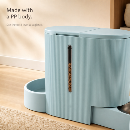 FeedFlow pet feeder in light blue, close-up of the ribbed food hopper with a clear window showing the kibble level inside.