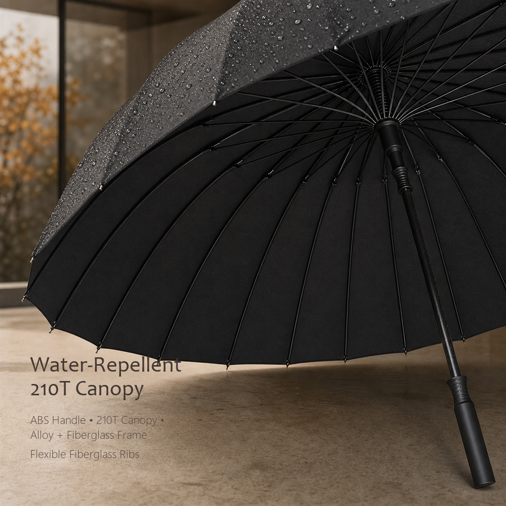 RainSpan automatic umbrella in classic black seen from below with water droplets beading on the canopy and the rib frame in close-up.