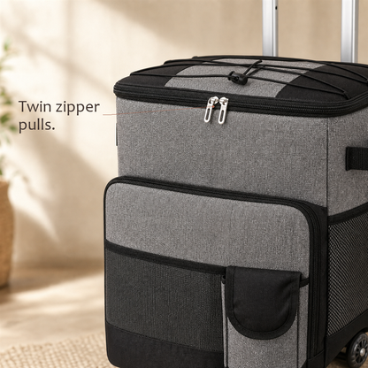 Close-up of RollChill gray rolling cooler showing twin zipper pulls and front pockets.