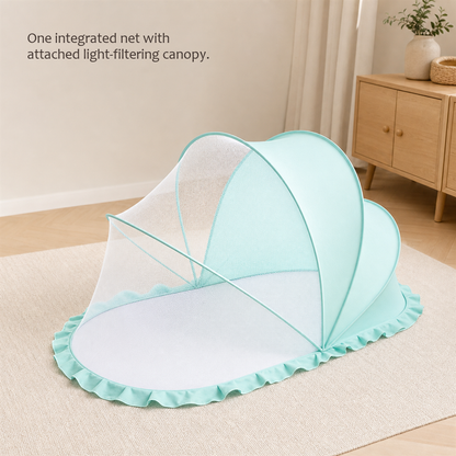 Close-up of SleepVeil mint green canopy mesh over a bed with text saying fine mesh helps keep mosquitoes out.