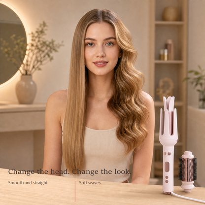 StyleOrbit hair styler in pink on a vanity beside a model with straight hair on one side, soft waves on the other.
